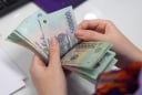 Đóng BHXH đủ 28 năm, là nữ giới sinh năm 1977 có được nghỉ hưu sớm?