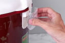 Tại sao nồi cơm điện phải có nắp hứng nước ở bên cạnh?