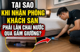Tại sao khi nhận phòng khách sạn phải lăn chai nước qua gầm giường?