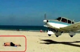 Tắm nắng trên bãi biển, suýt bị máy bay lao vào người