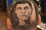 Fan cuồng khắc hình Ronaldo... lên đầu