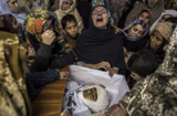 Vụ thảm sát trường học: Đẫm nước mắt đưa tang 141 nạn nhân