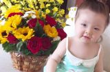 Con gái Elly Trần tạo dáng bên hoa siêu đáng yêu