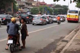 Chân dung 'nữ quái' mang kim tiêm ra đường xin đểu ở Hà Nội
