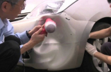 Người Nhật sửa vết móp trên ô tô theo cách khó tin