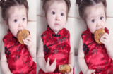 Con gái Elly Trần diện áo dài đỏ ăn bánh trung thu siêu đáng yêu