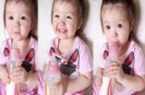 Con gái Elly Trần lần đầu tập uống sữa một mình