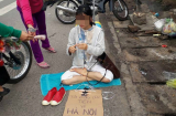 Cô gái ngồi giữa đường xin tiền về Hà Nội: 'Khi thì bắt chước tiếng chó hú,khi nói ú ớ không ra tiếng người'