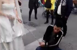 Chú rể bị cô dâu xích tay kéo trên phố vì trốn đám cưới của chính mình