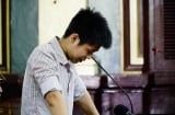 Nguyễn Hữu Tình thản nhiên cười tại phiên tòa xét xử
