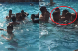 Cô gái bị nhóm thanh niên quây kín rồi giở trò sàm sỡ giữa bể bơi