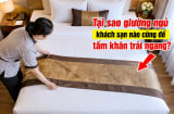Tại sao giường ngủ khách sạn nào cũng để tấm khăn trải ngang?