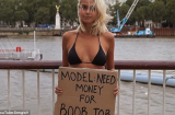 SỐC: Video cô gái mặc bikini đứng giữa đường để 'xin tiền nâng ngực' và sự thật phía sau