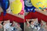 Cách dỗ con siêu hài hước của ông bố trẻ: buộc 4-5 quả bóng vào tay chân để con không khóc tiếng nào