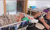 Con trai bại liệt chăm cha già 62 tuổi nằm bất động tại giường