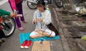 Cô gái ngồi giữa đường xin tiền về Hà Nội: Khi thì bắt chước tiếng chó hú,khi nói ú ớ không ra tiếng người