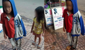 Bức xúc cảnh bé trai 10 tuổi bị bố mẹ xích tay chân lang thang giữa chợ