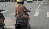 Giữa đường phố nhưng 2 cô gái trẻ thản nhiên mặc hở bạo lái xe máy khiến người đi đường đỏ mặt