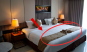 Tại sao giường khách sạn thường xuất hiện một miếng vải trải ngang? Phải chăng công dụng chỉ để trang trí?