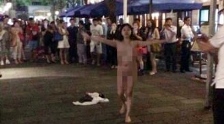 Thiếu nữ khỏa thân nhảy múa giữa thủ đô Bắc Kinh