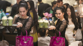 Ngọc Trinh đeo túi tiền tỉ mặc váy sành điệu chen mua cà phê
