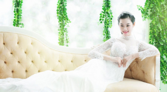 Linh Chi 'cất vòng một' kín đáo diện áo dài cưới xinh tươi