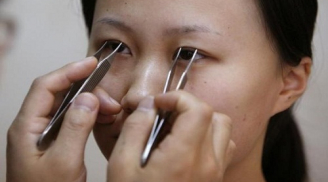 Gái Trung Quốc nghiến răng nâng ngực, sửa mũi để xin việc
