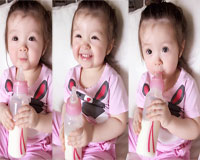 Con gái Elly Trần lần đầu tập uống sữa một mình