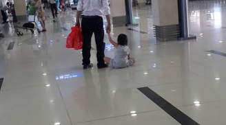 Mẹ dửng dưng để con gái bị đánh, kéo lê tại sân bay Tân Sơn Nhất