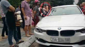 Ông bố Hà Nội đập vỡ kính xe BMW cứu con gái bị mắc kẹt