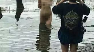 Cô gái phải trả giá đắt vì uốn éo chụp hình khỏa thân giữa hồ
