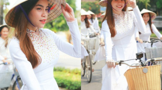 Nắng chang chang, Hà Hồ diện áo dài đội nón lá đạp xe đạp giữa đường