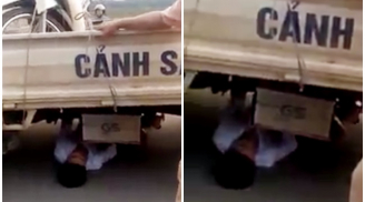 Vi phạm giao thông, nam thanh niên chui gầm xe CSGT “ăn vạ”