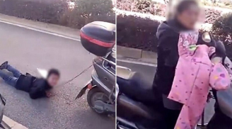 SỐC: Mẹ trói tay con trai vào xe máy kéo lê trên đường vì... nghịch