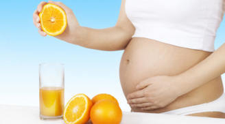 Mang thai 3 tháng đầu có nên uống nước cam không?