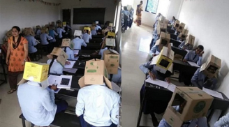 Bắt sinh viên đội thùng giấy lên đầu để làm bài kiểm tra, trường học hứng chỉ trích