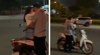 Cặp đôi dựng xe máy, ôm hôn nhau thắm thiết giữa đường như đang ở chốn riêng tư