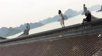 Cặp đôi bất chấp trèo lên nóc ngôi chùa lớn nhất Việt Nam để 'sống ảo'