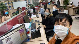 Đại dịch virus Corona hoành hành: Dân công sở ngồi làm việc vẫn đeo khẩu trang kín mít