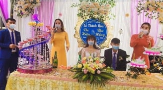 Đại dịch Corona bùng phát: Cô dâu chú rể, MC đám cưới cũng đeo khẩu trang kín mít trên sân khấu