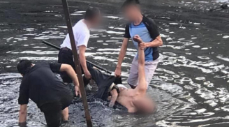 Nam thanh niên có biểu hiện lạ, cởi áo tắm dưới sông Kim Ngưu 'đen ngòm'
