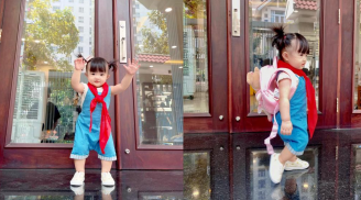 Con gái Đông Nhi được bố mẹ đeo khăn quàng và mang cặp đi học đáng yêu hết nấc