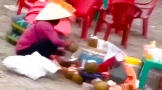 Người phụ nữ gom nước dừa thừa ở khu du lịch gây tranh cãi trên mạng