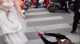 Trốn đám cưới, chú rể bị cô dâu dùng xích sắt lôi xềnh xệch trên phố khiến nhiều người ngỡ ngàng