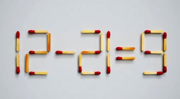 Di chuyển một que diêm để 12-21=9 thành phép tính đúng