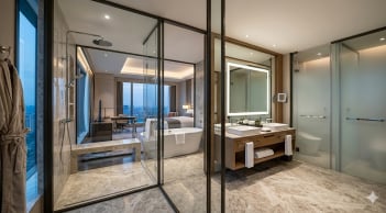 Tại sao phòng tắm khách sạn ngày nay toàn dùng vách kính trong suốt?